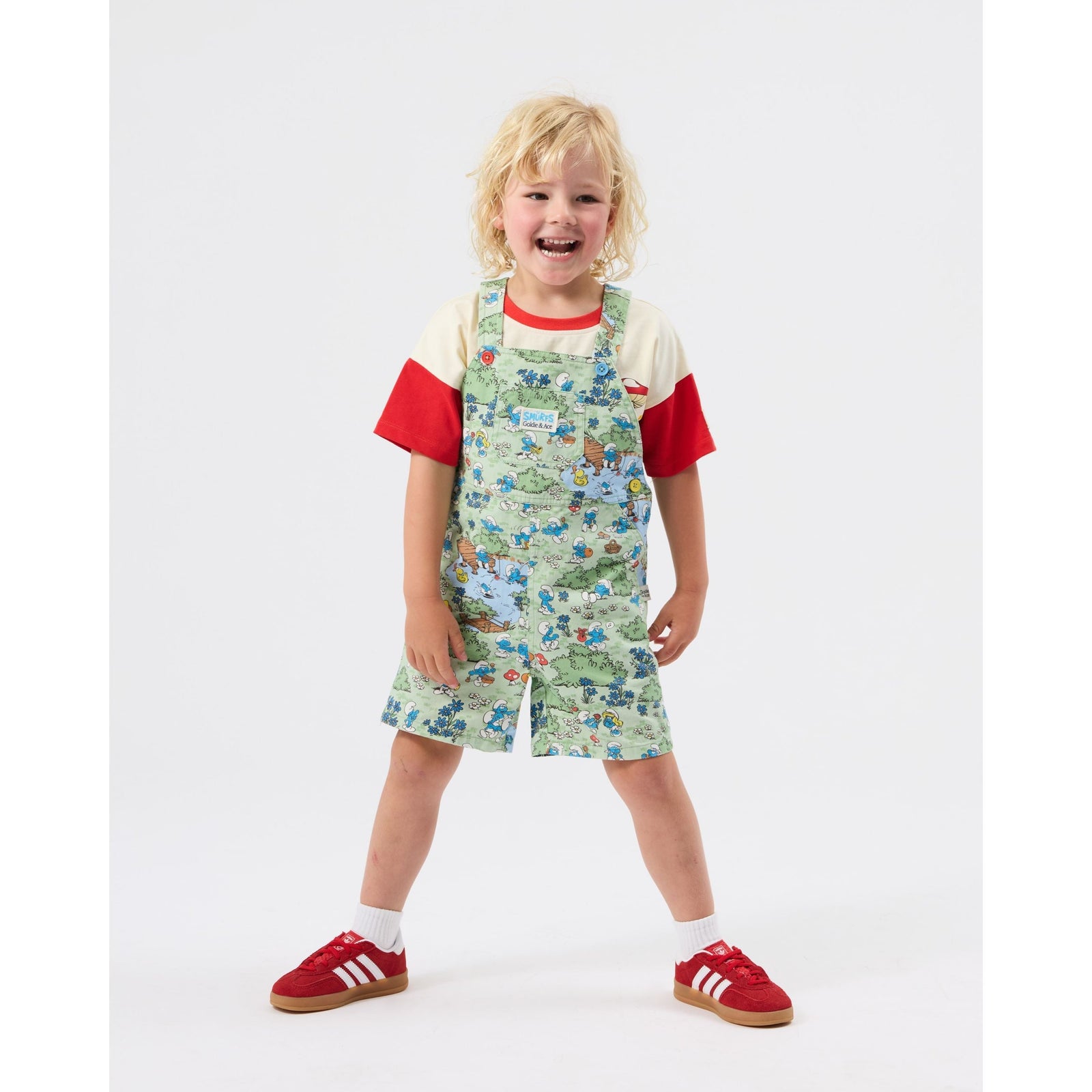 Child wearing Goldie & Ace x The Smurfs Village Print Burton Overall