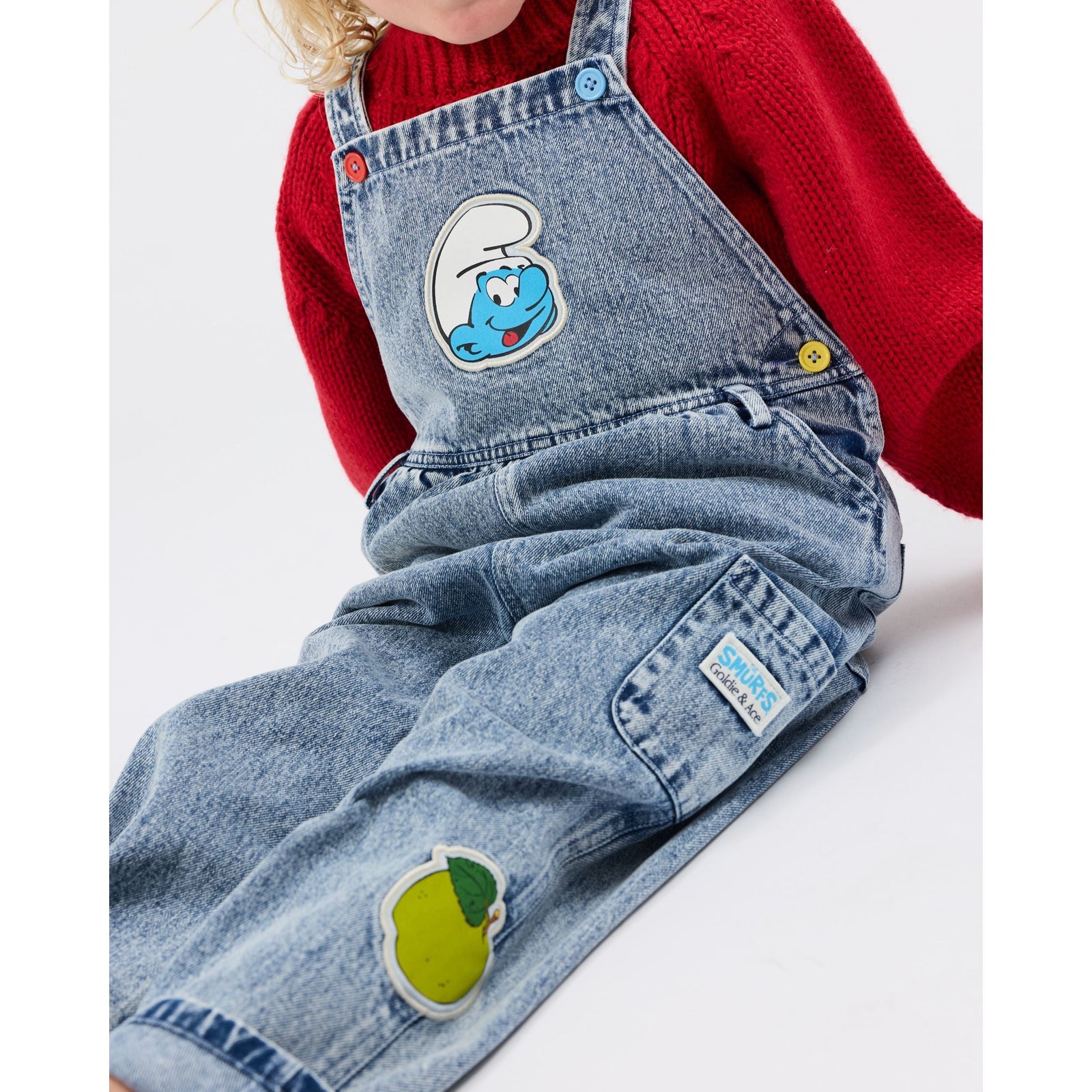 Child wearing Goldie & Ace x The Smurfs Patch Austin Overalls