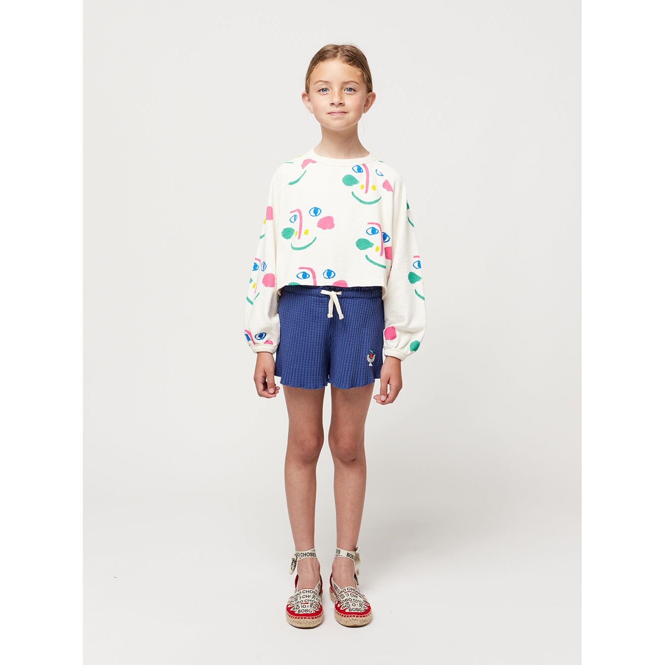 Smiling Mask All Over Raglan Sleeves Cropped Sweatshirt