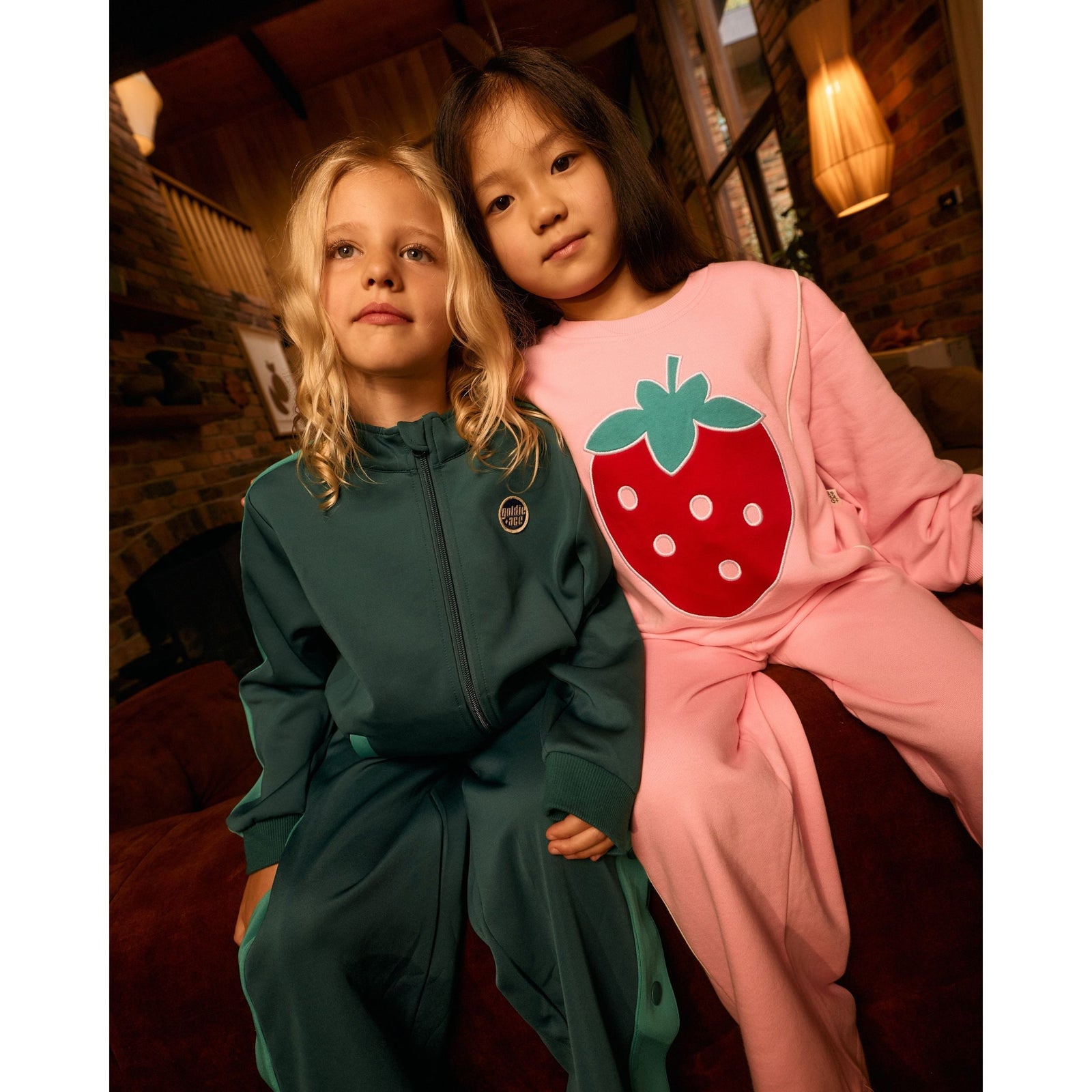 Child wearing Goldie & Ace Jumbo Strawberry Piped Sweater