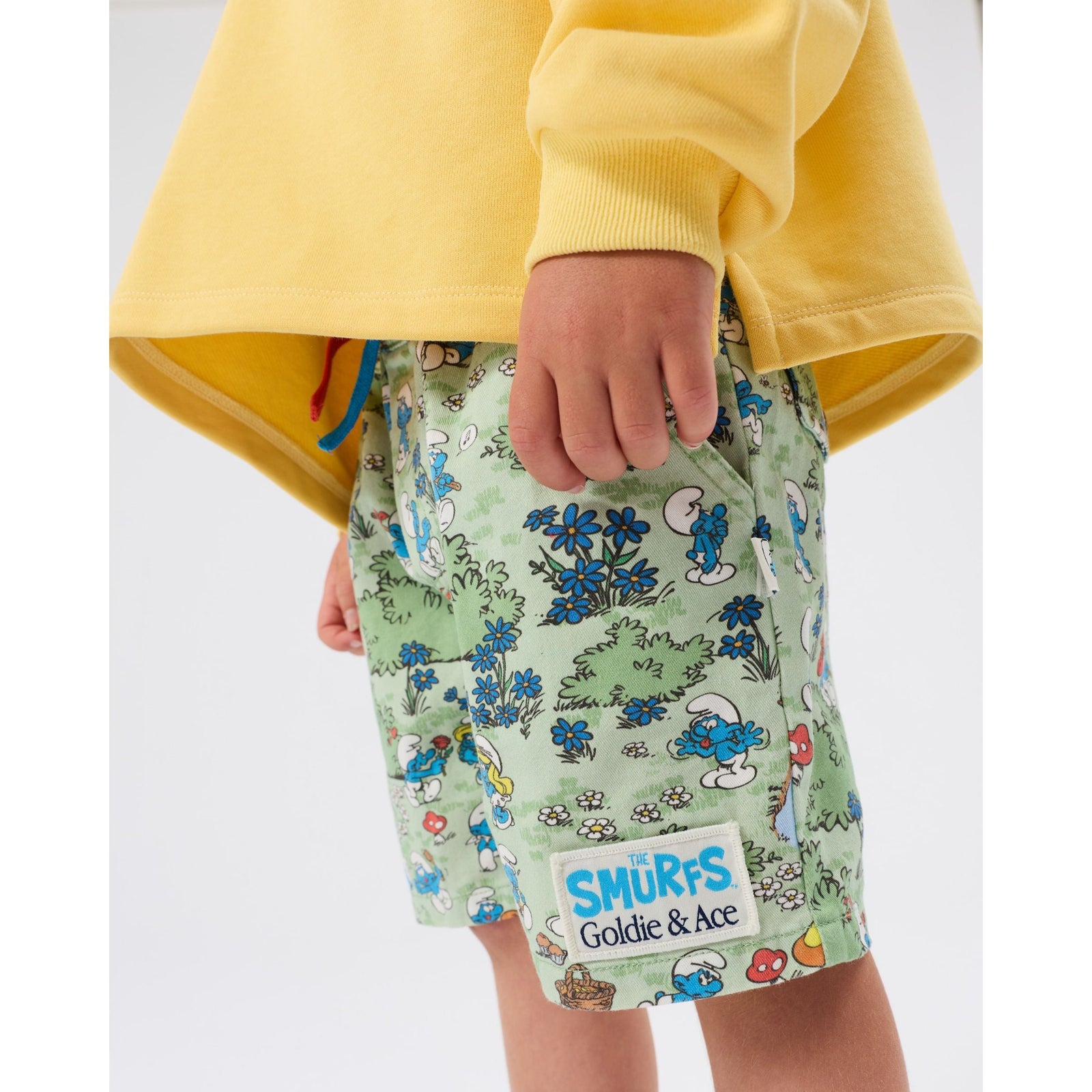 Child wearing Goldie & Ace x The Smurfs Village Print Shorts