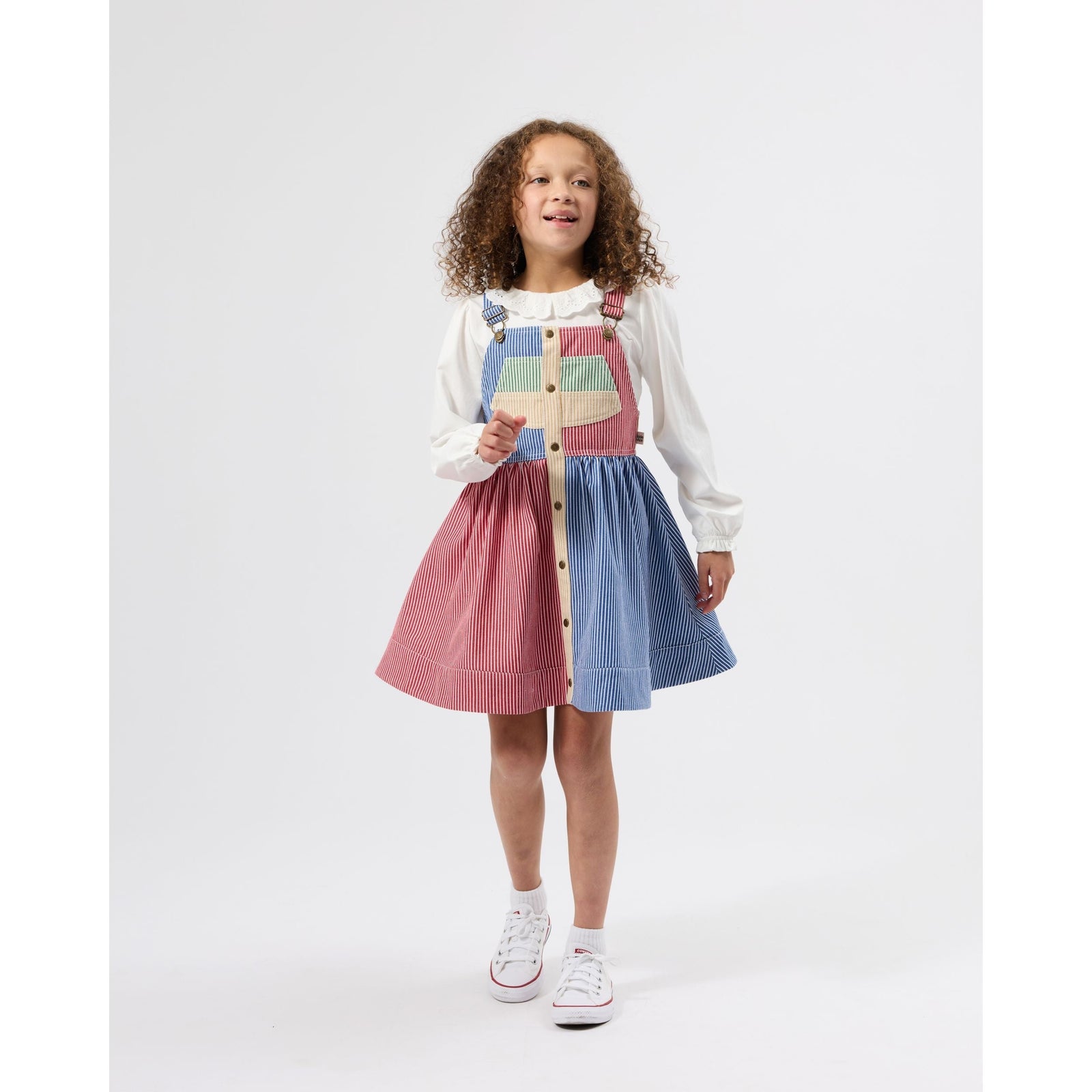 Child wearing Goldie & Ace Patchwork Stripe Heidi Pinafore Dress, view 4