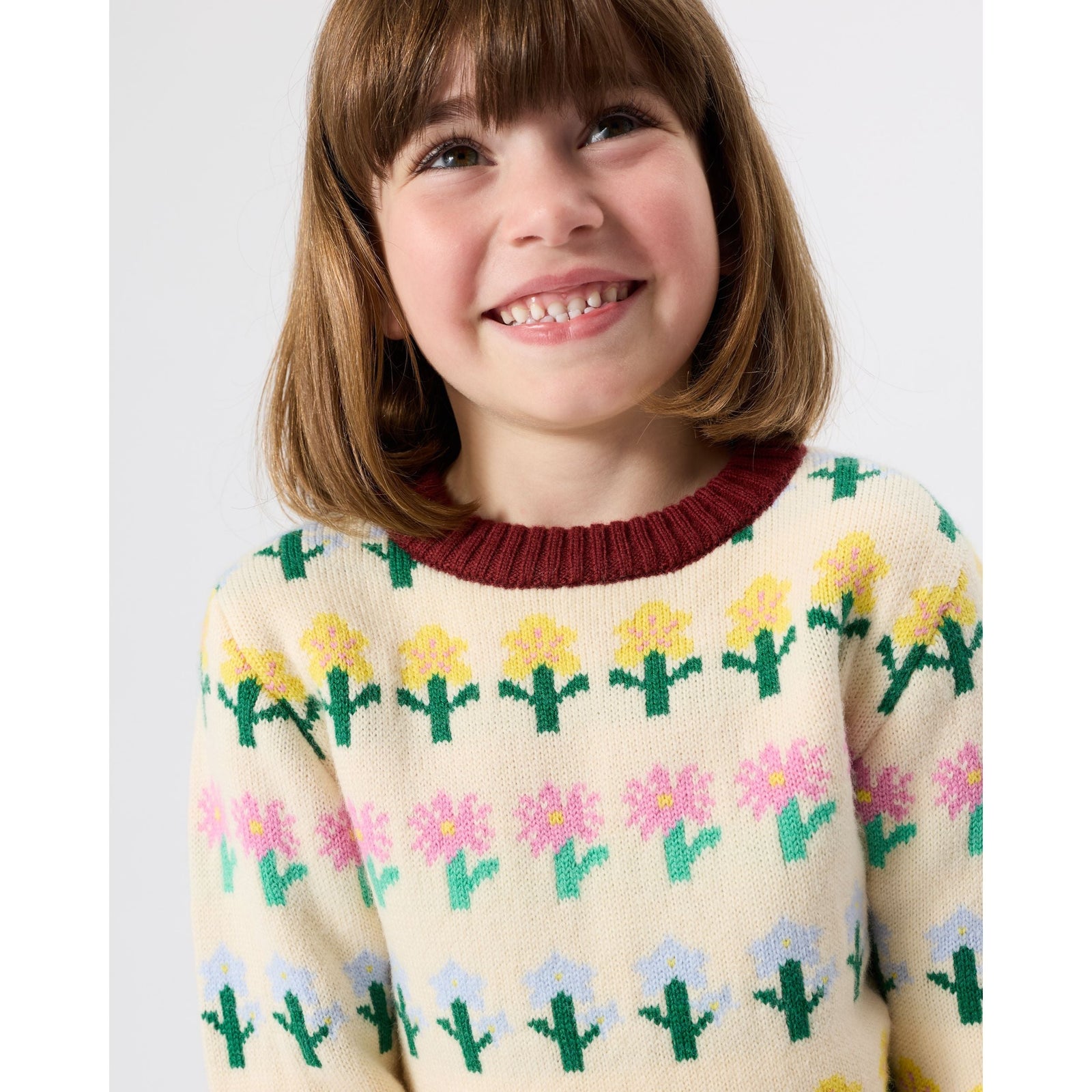 Child wearing Goldie & Ace Flower Garden Knit Jumper