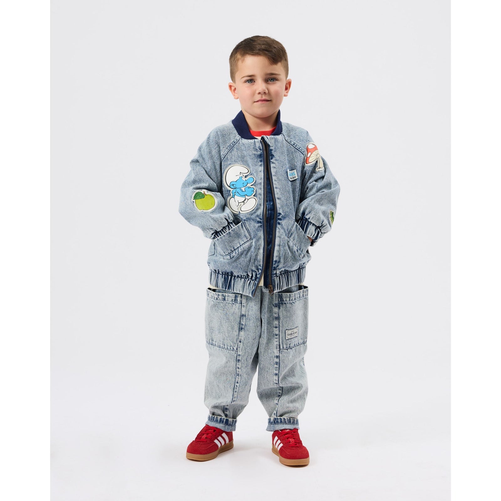 Child wearing Goldie & Ace x The Smurfs Badge Bomber Jacket, view 3