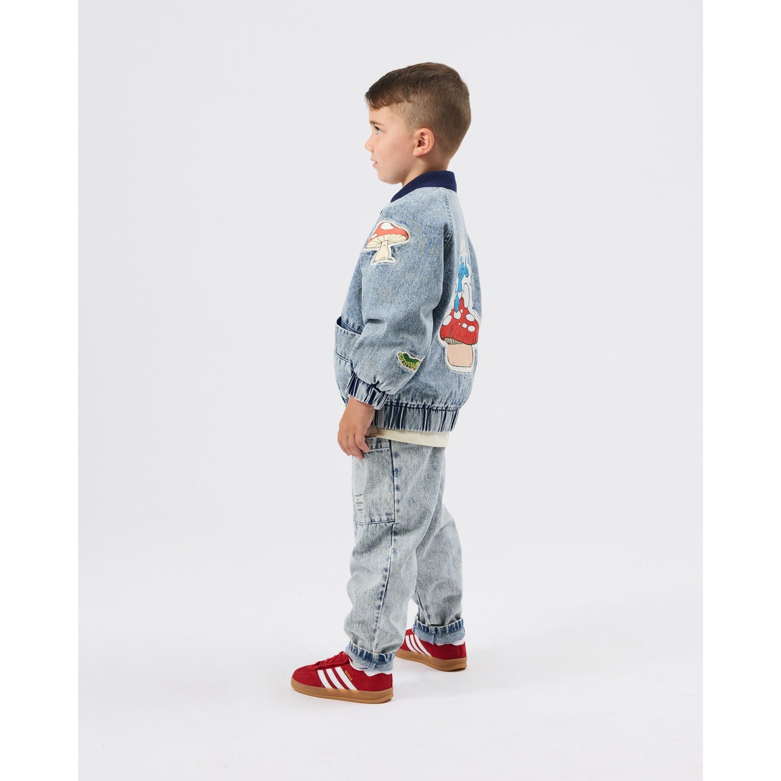 Child wearing Goldie & Ace x The Smurfs Badge Bomber Jacket, view 4