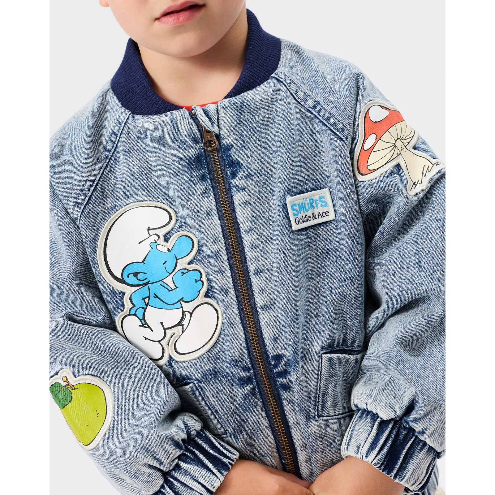 Child wearing Goldie & Ace x The Smurfs Badge Bomber Jacket, view 6