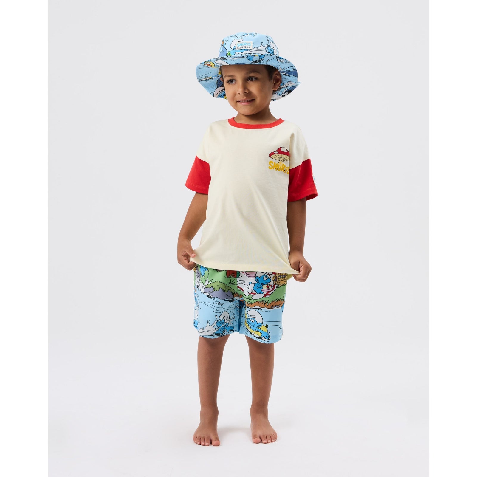 Child wearing Goldie & Ace x The Smurfs Splash Boardshort, view 4