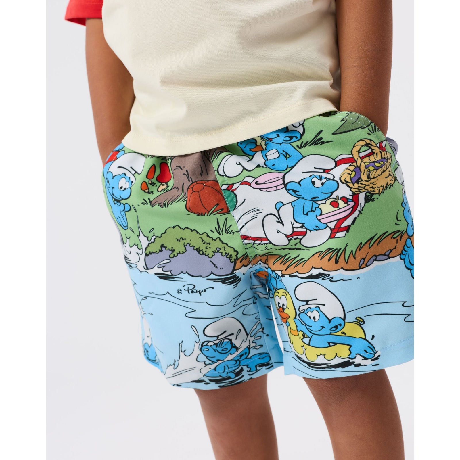 Child wearing Goldie & Ace x The Smurfs Splash Boardshort