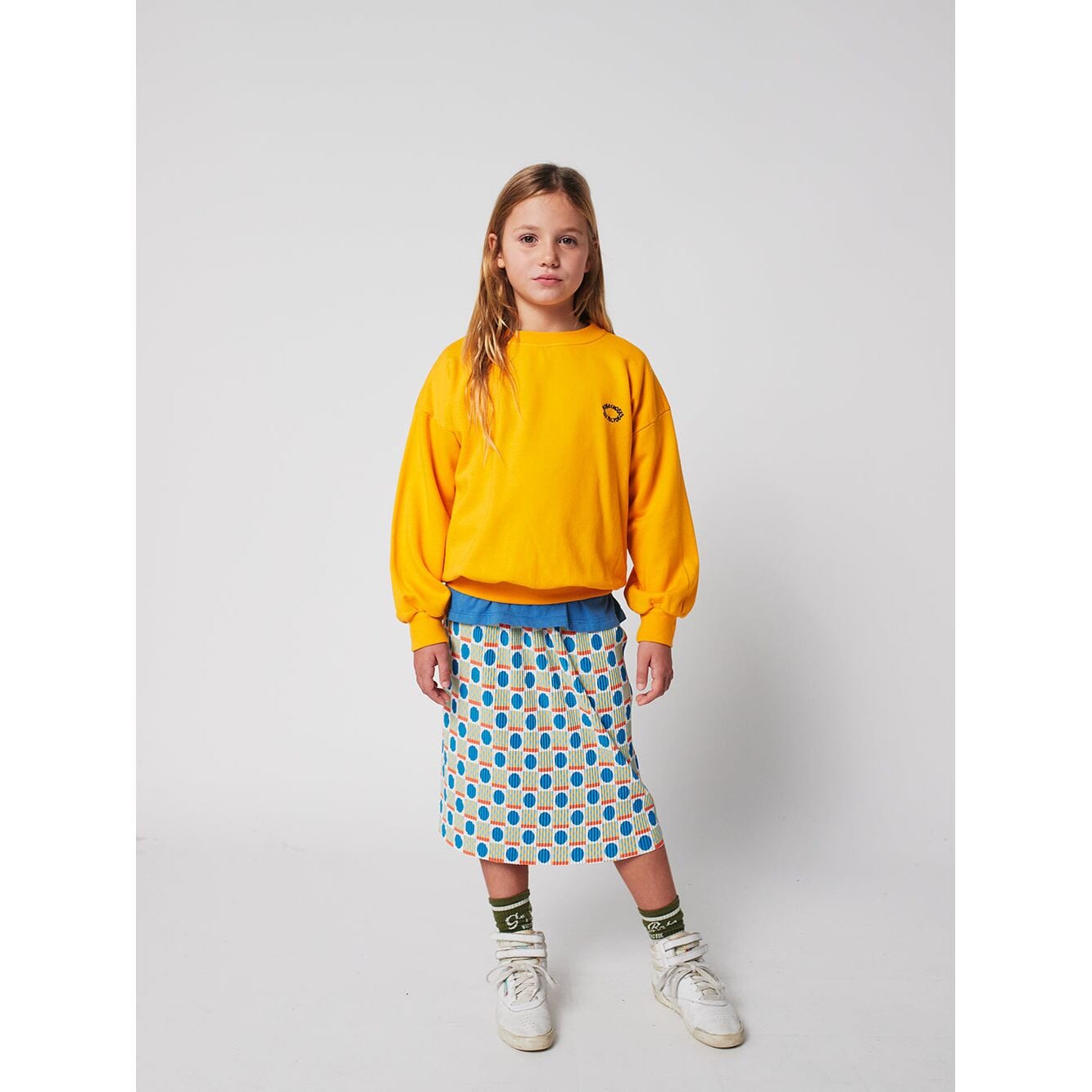 Geometric Scacs Over Pencil Pleated Skirt