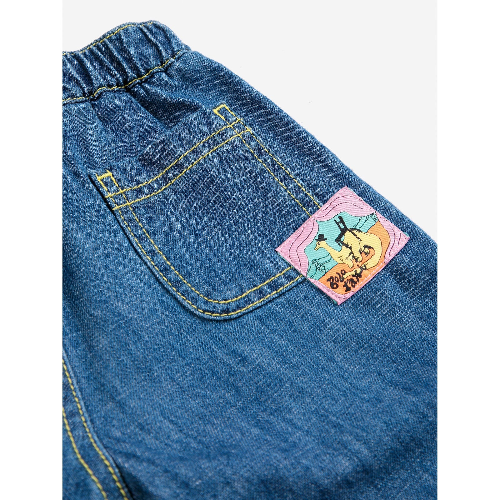 Bobo Choses Taxi Saurus Tag Denim Pants, All About Monsters collection, view 5