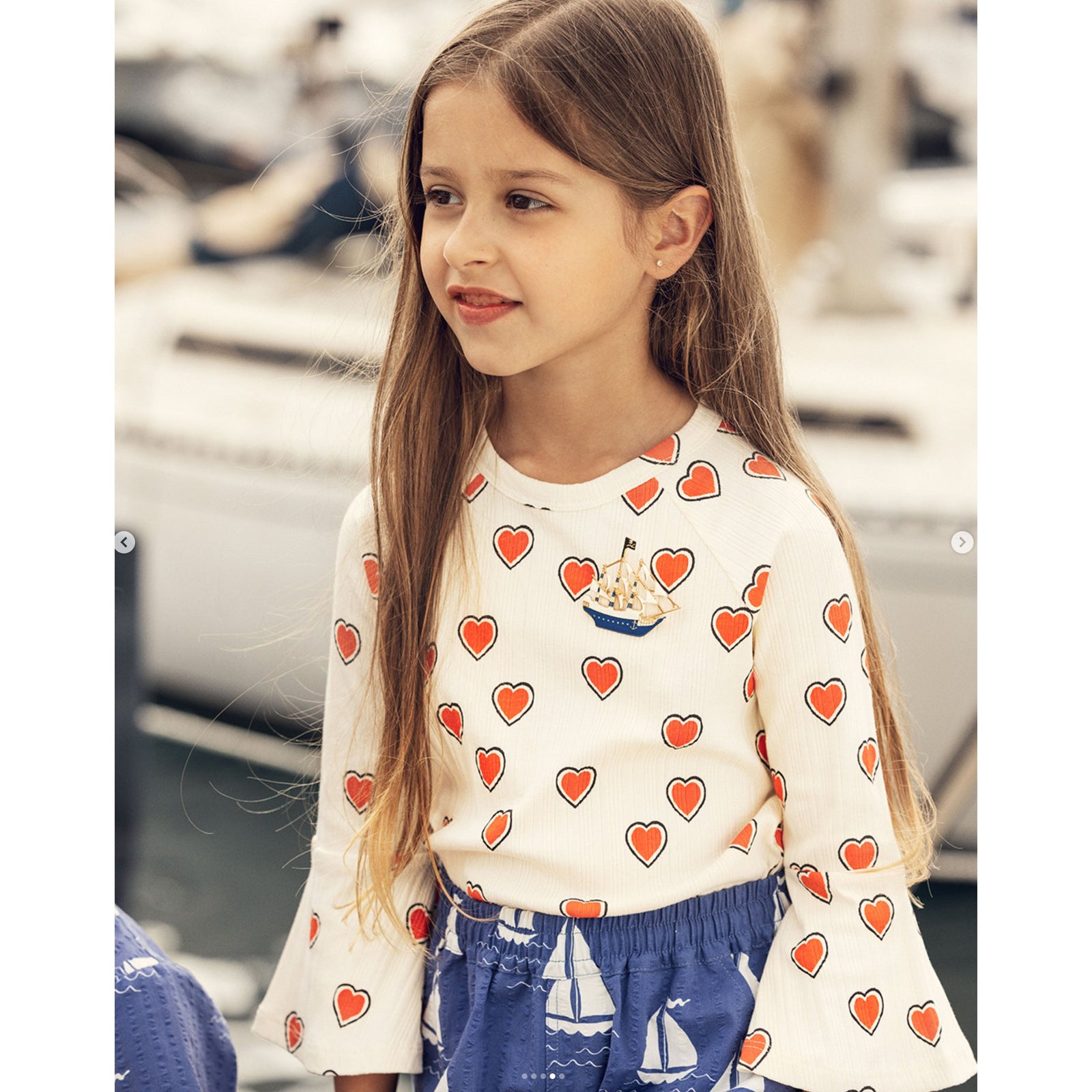 Outlined Hearts Trumpet Sleeve Top