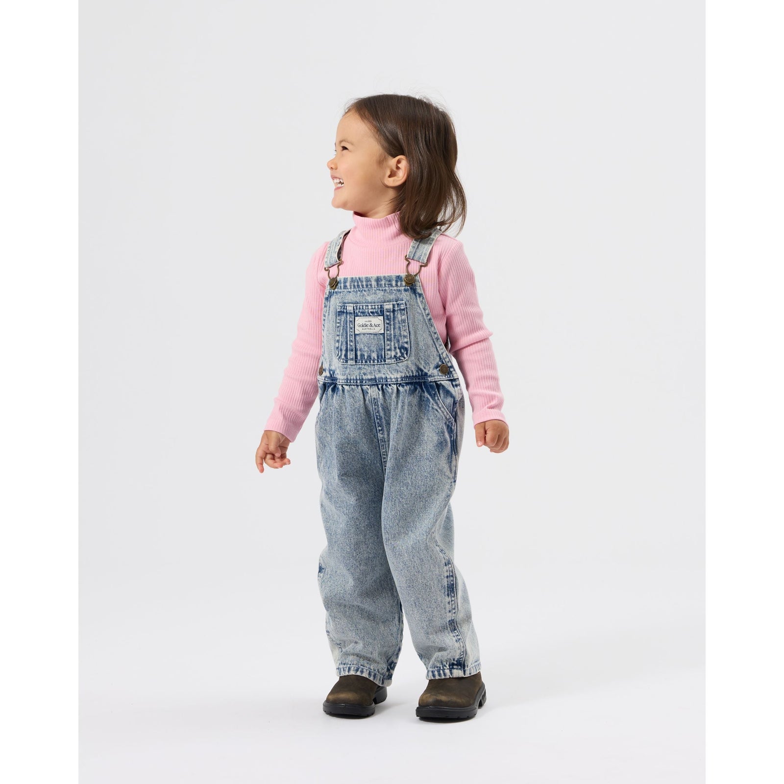 Child wearing Goldie & Ace Austin Vintage Washed Denim Overalls Light Denim, view 2
