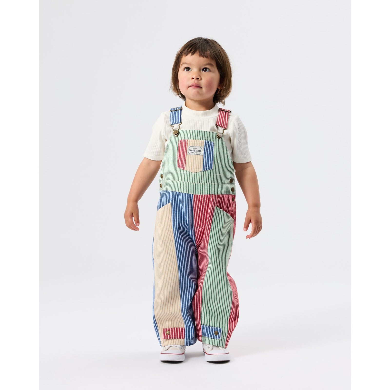 Child wearing Goldie & Ace Patchwork Stripe Blake Overalls