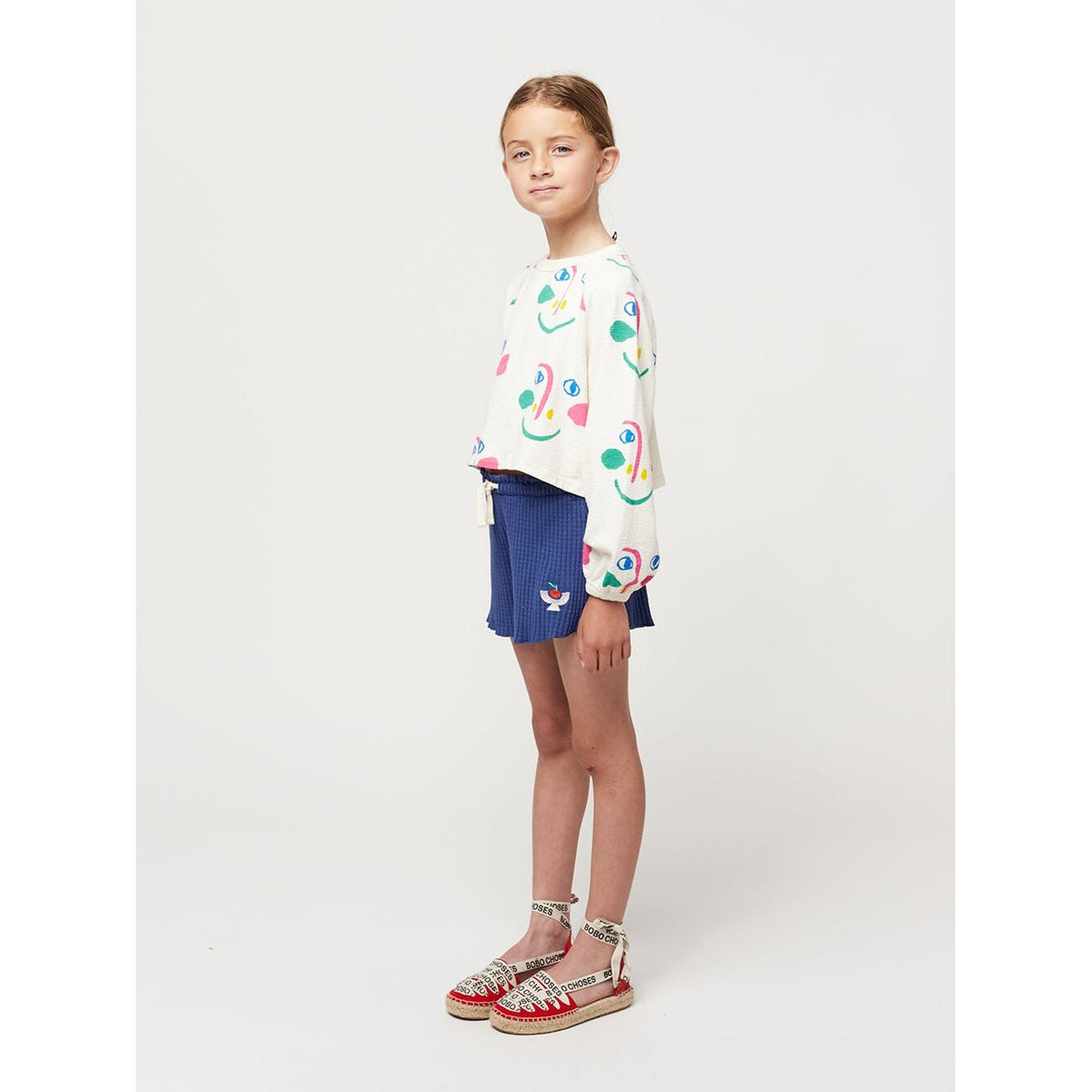 Smiling Mask All Over Raglan Sleeves Cropped Sweatshirt