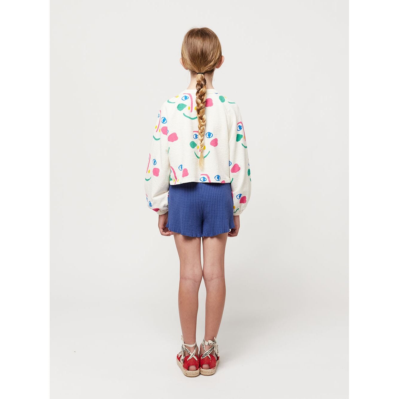 Smiling Mask All Over Raglan Sleeves Cropped Sweatshirt