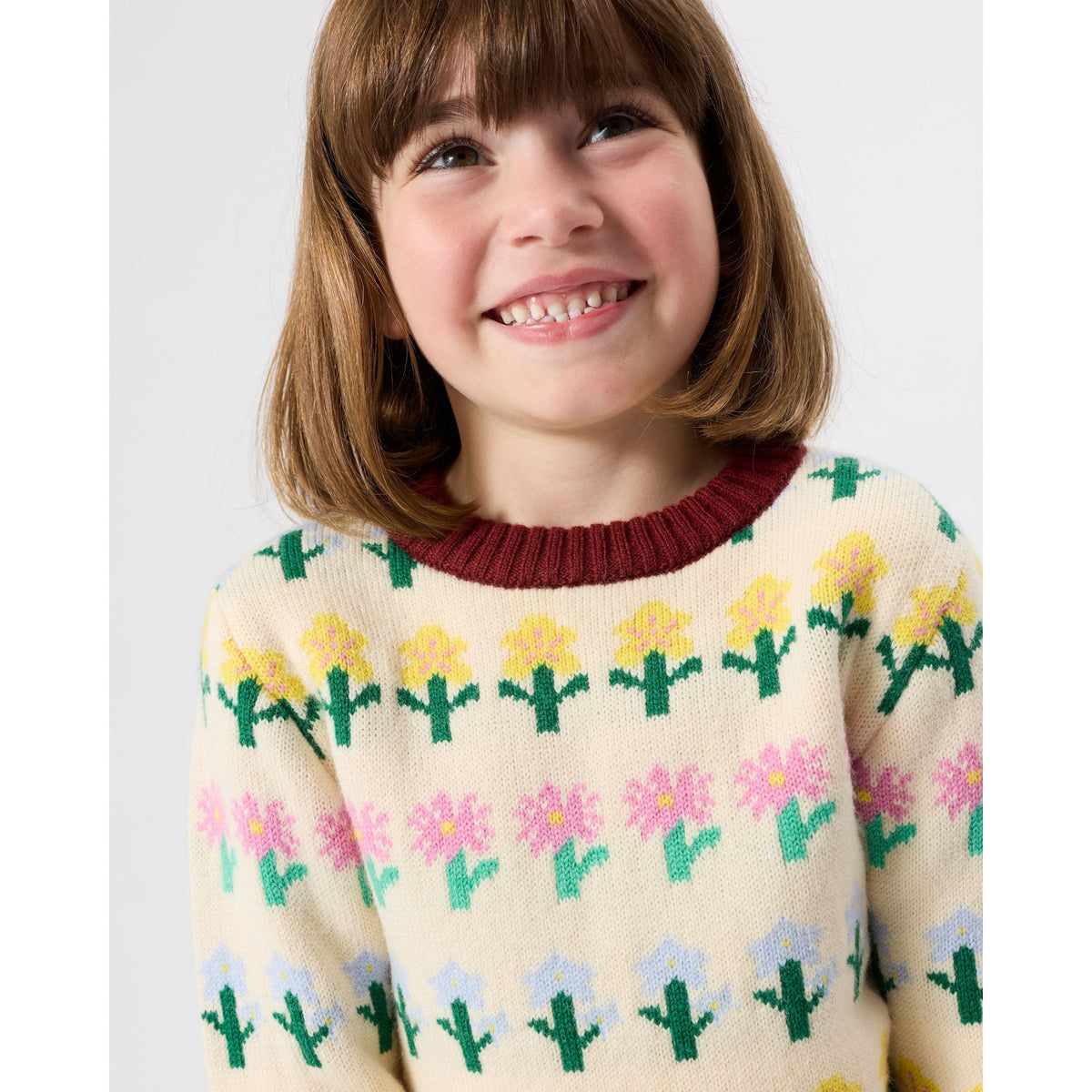 Child wearing Goldie & Ace Flower Garden Knit Jumper