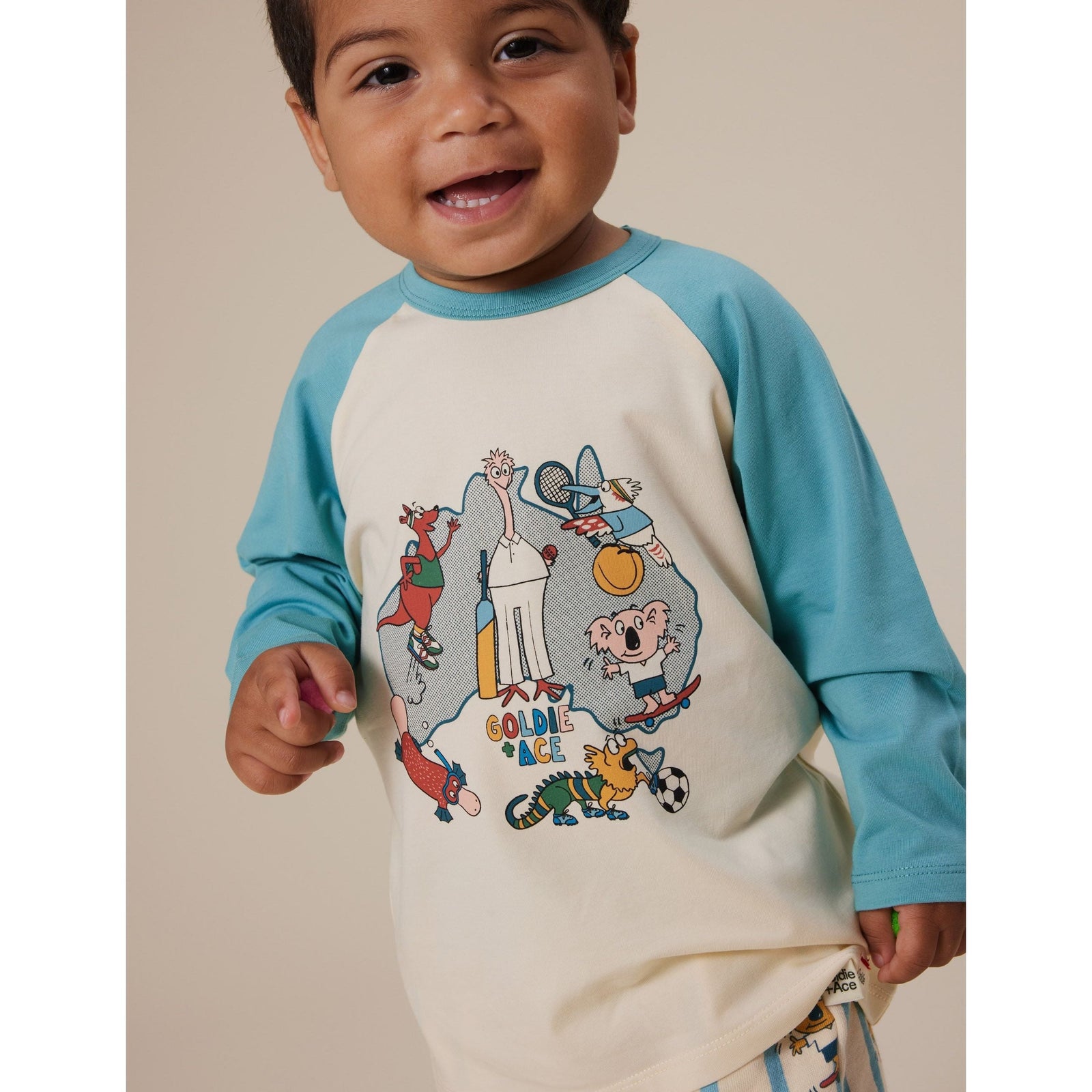Team Goldie Raglan Long Sleeve Top