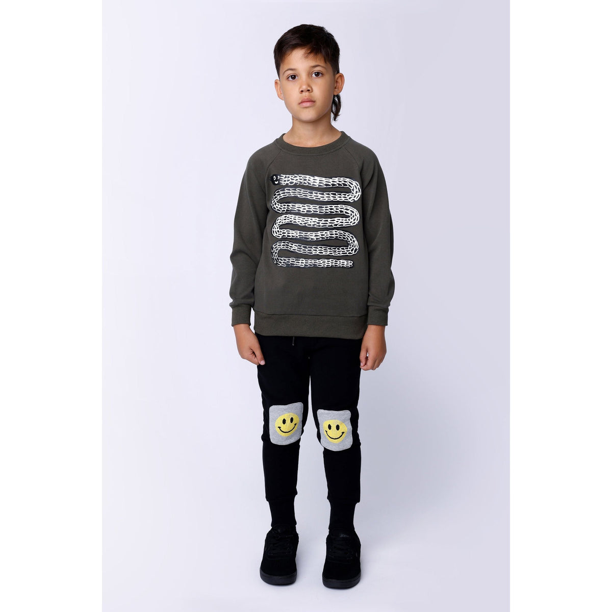 Pixelled Face Furry Trackies